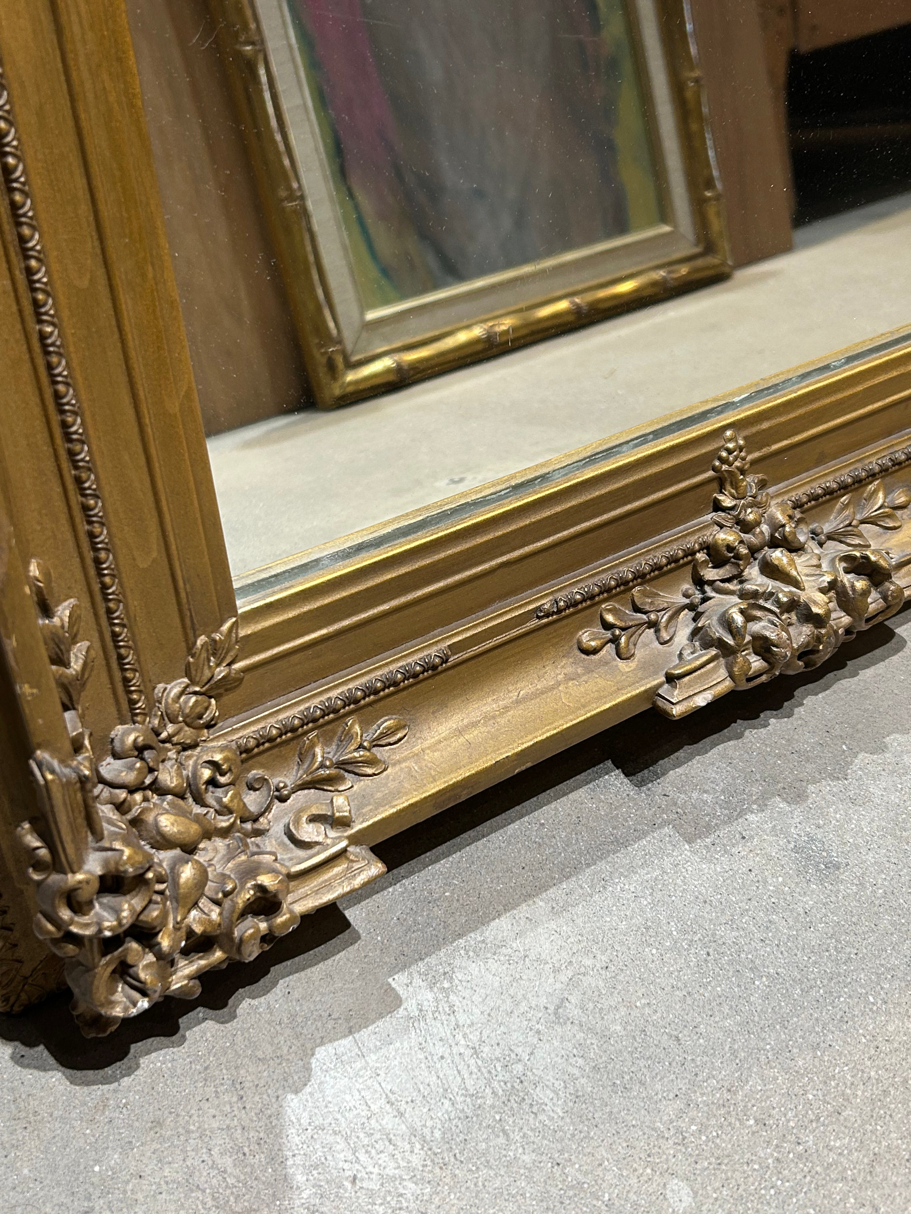 Ornate gold mirror