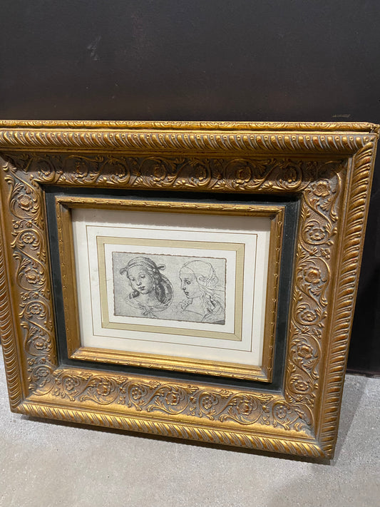 Print in ornate gold frame