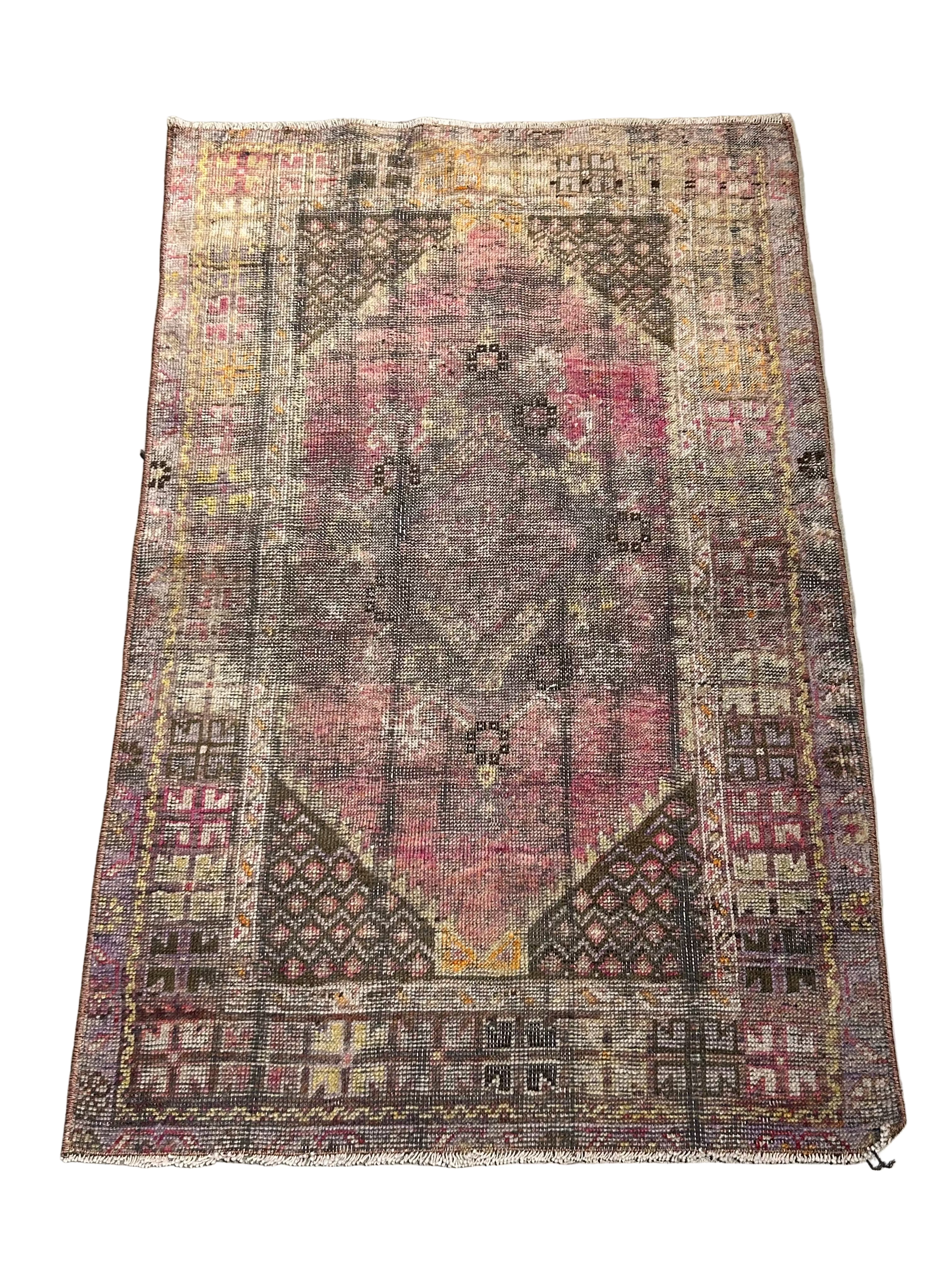 Vintage pink and brown rug
