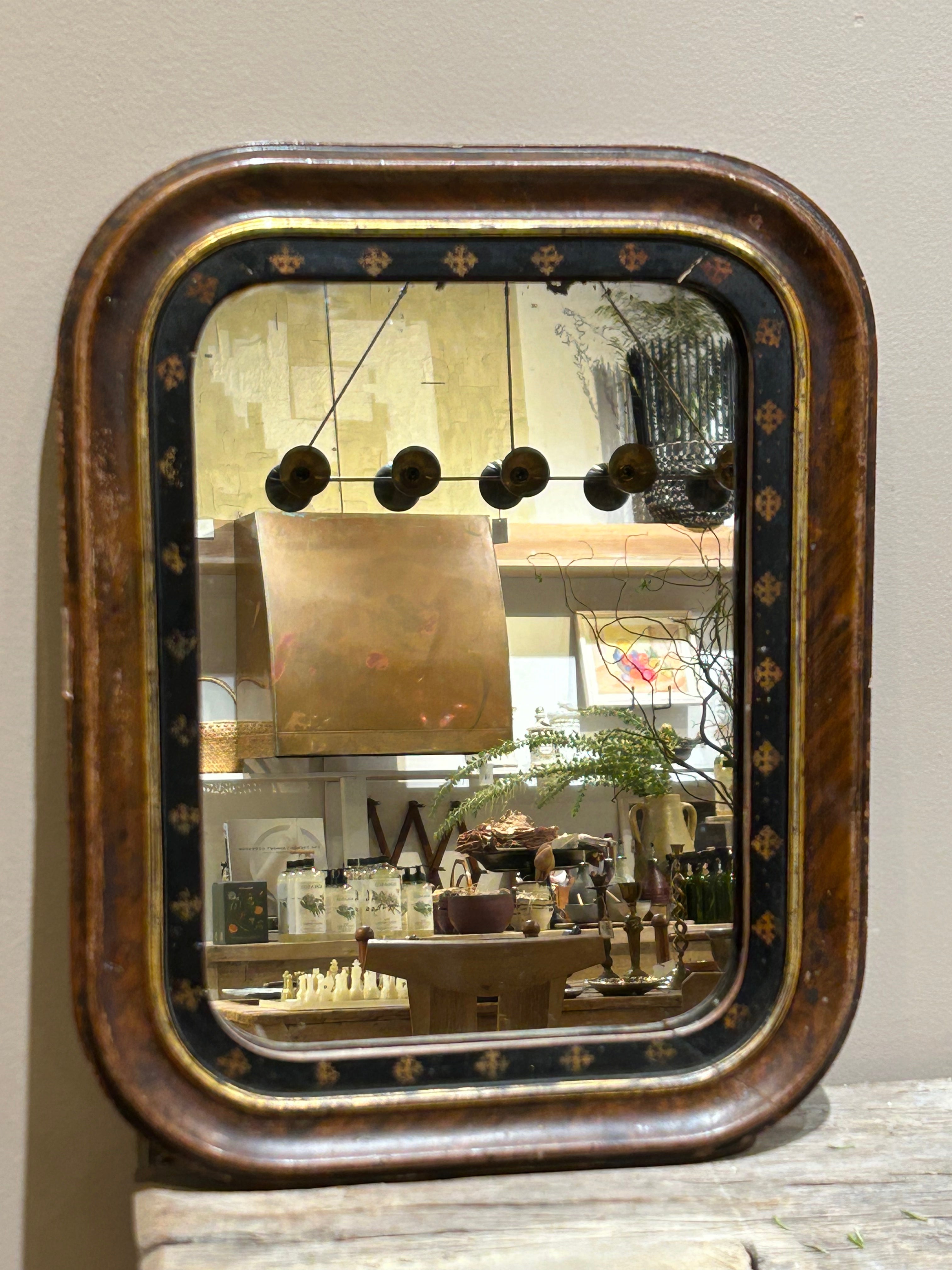 Vintage wood and gilt wall mirror