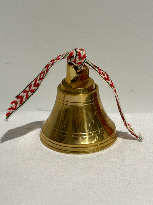 Vintage gold bell with ribbon