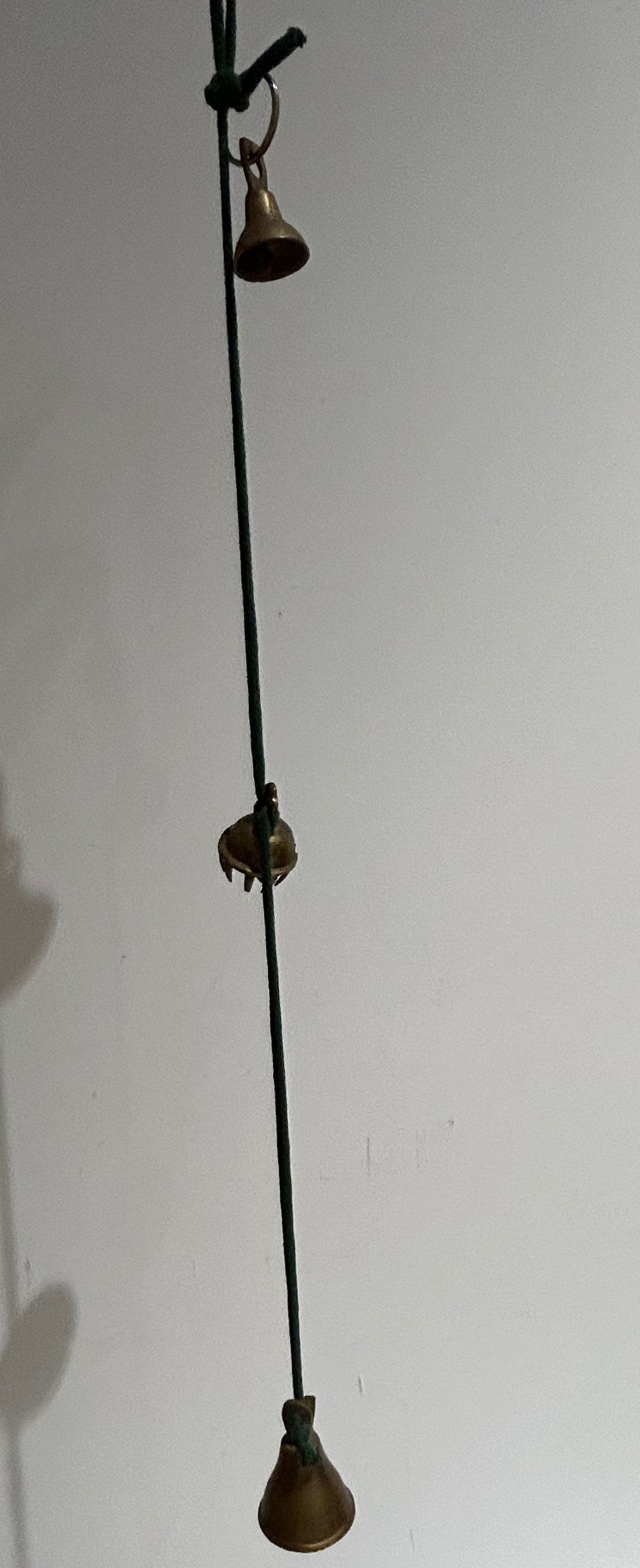 Vintage string of brass bells