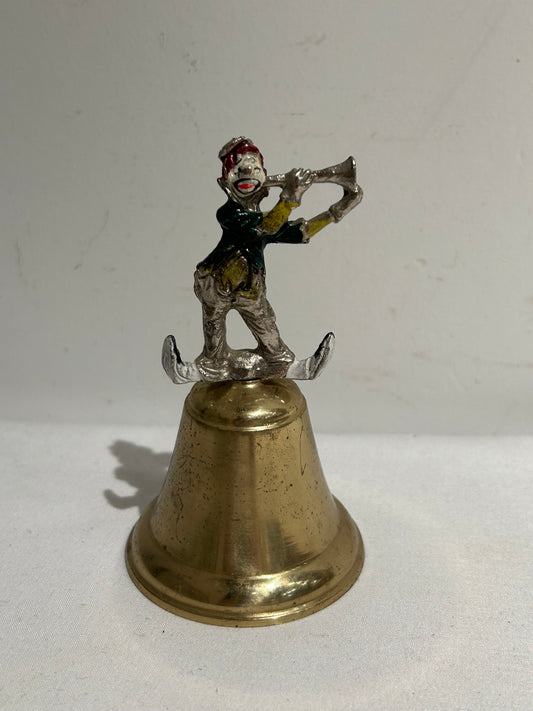 Vintage brass bell with clown