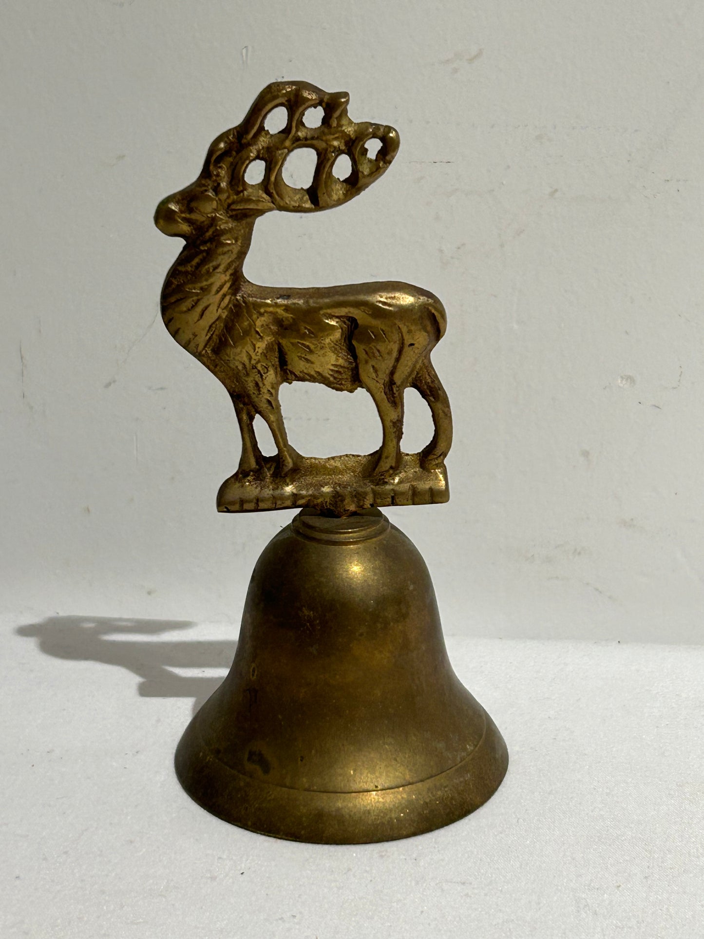 Vintage brass reindeer bell