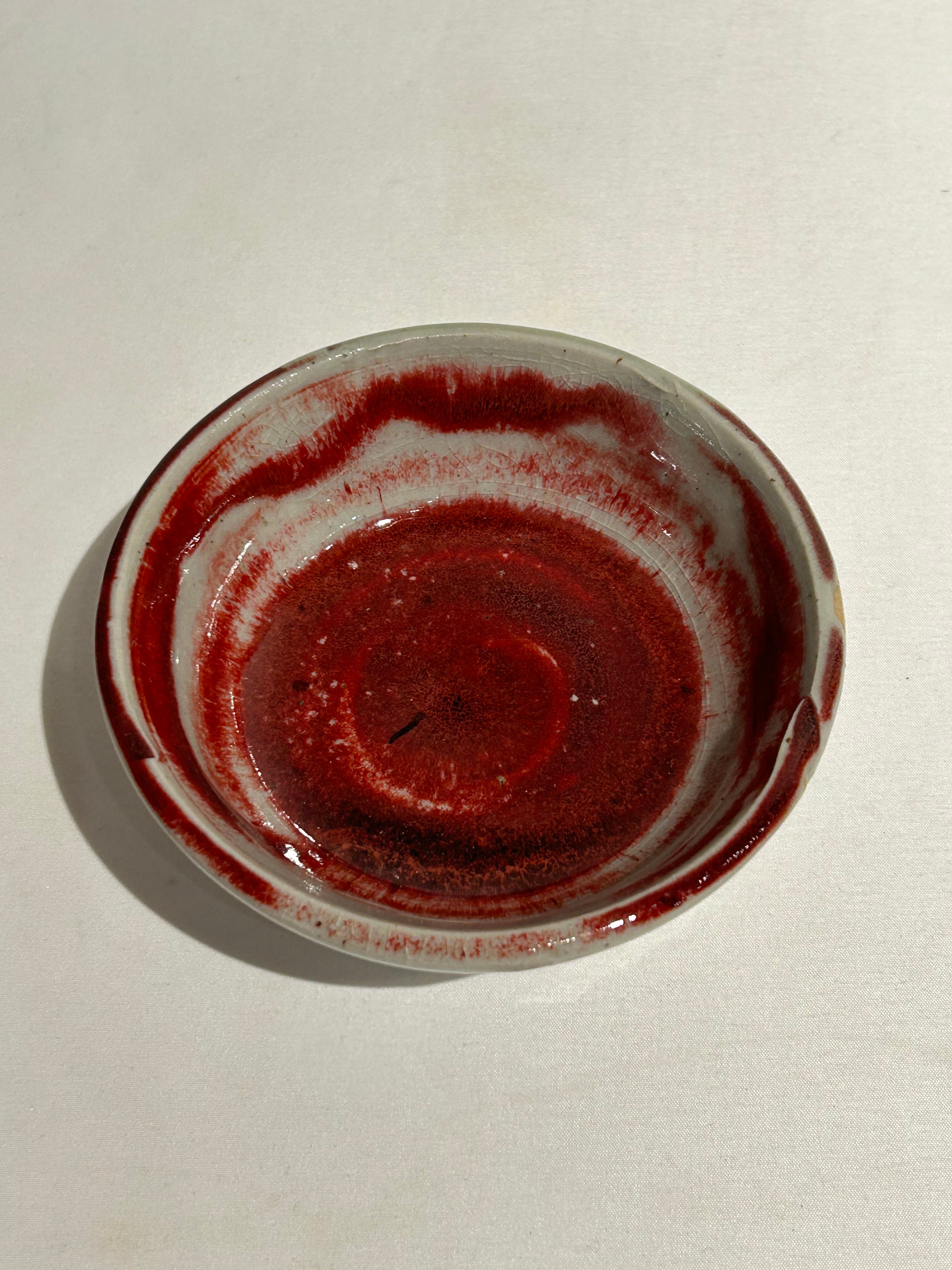 Vintage red ceramic bowl