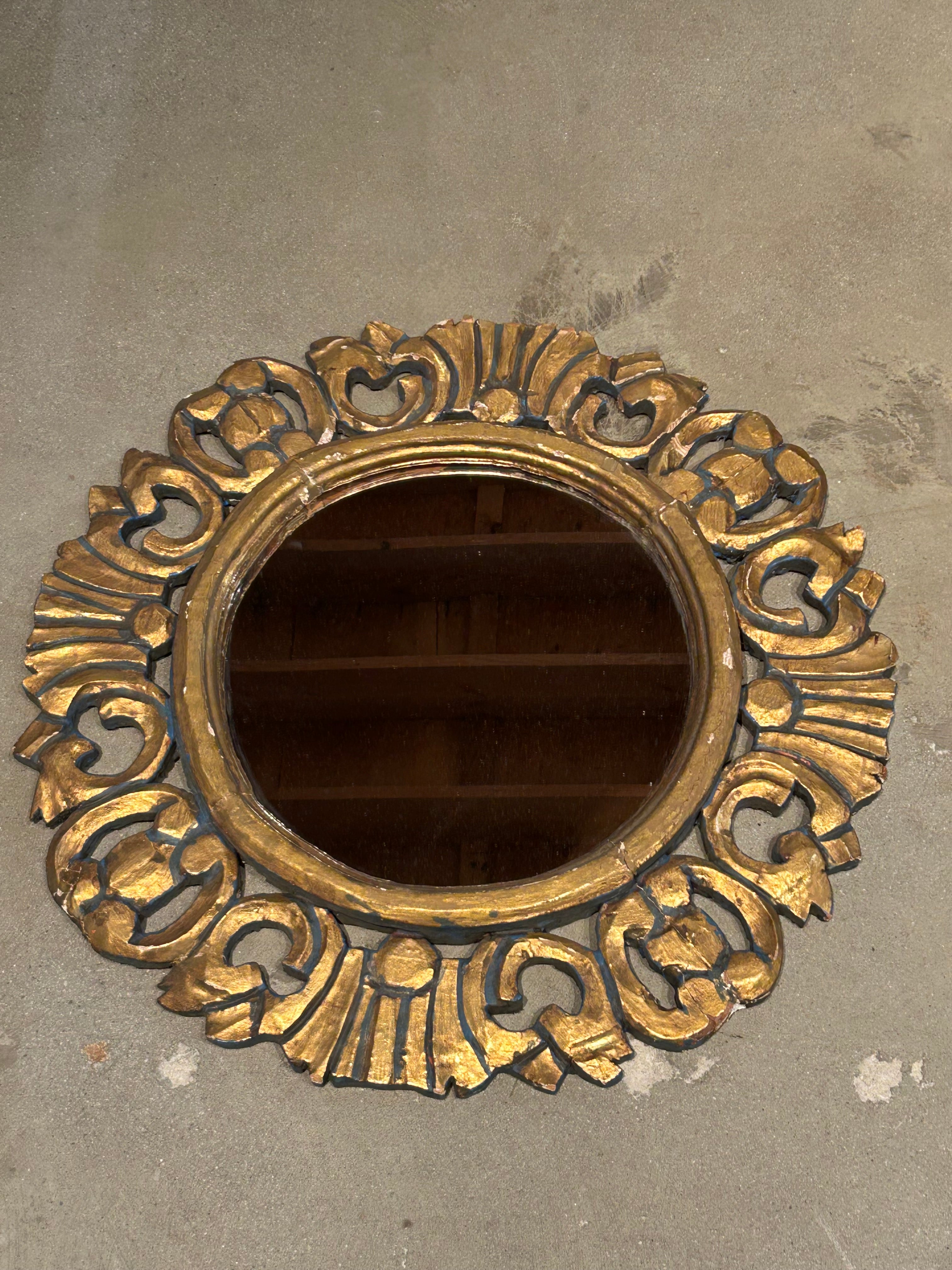 Vintage circular ornate mirror