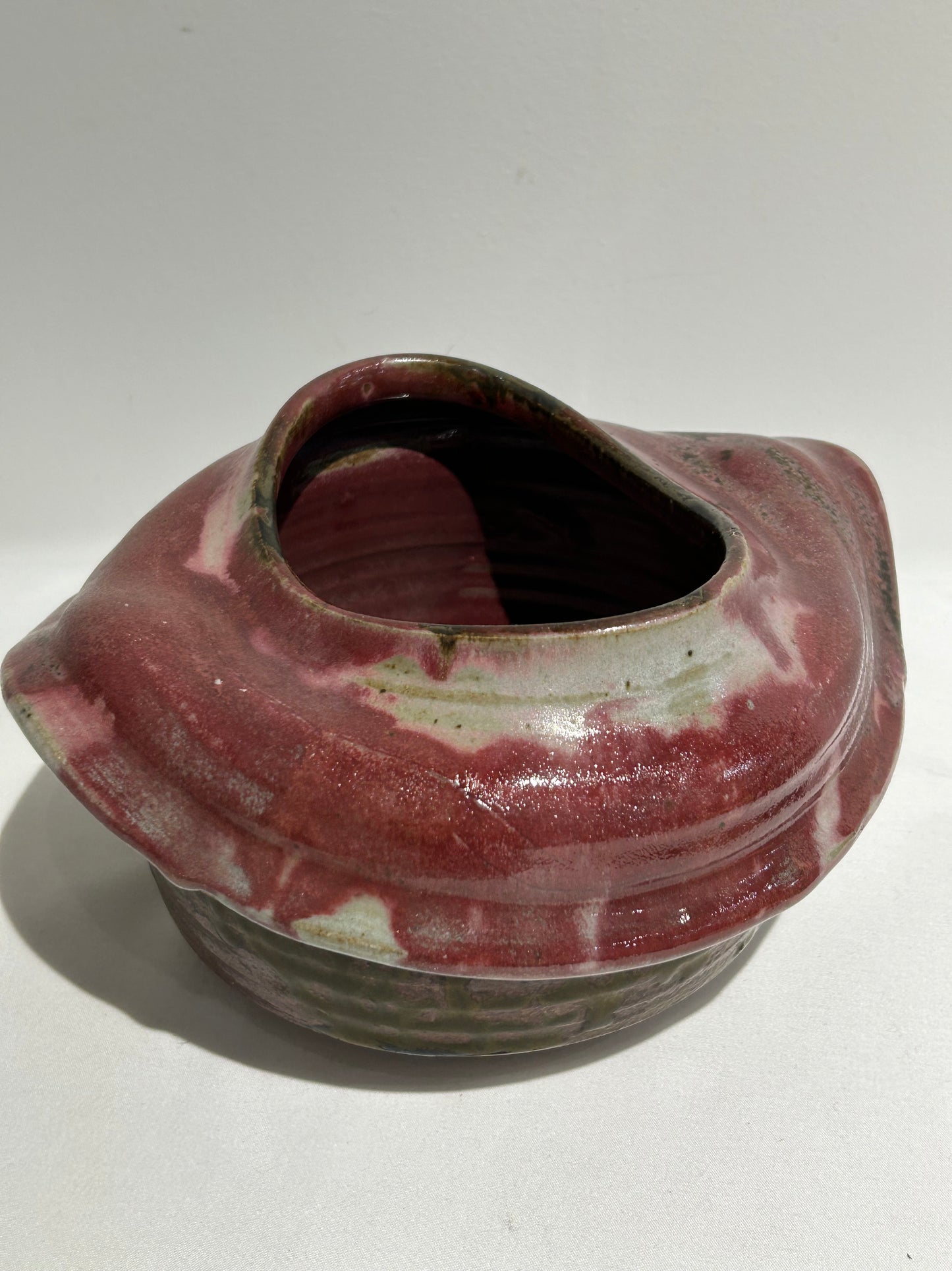 Vintage wavy ceramic vessel signed