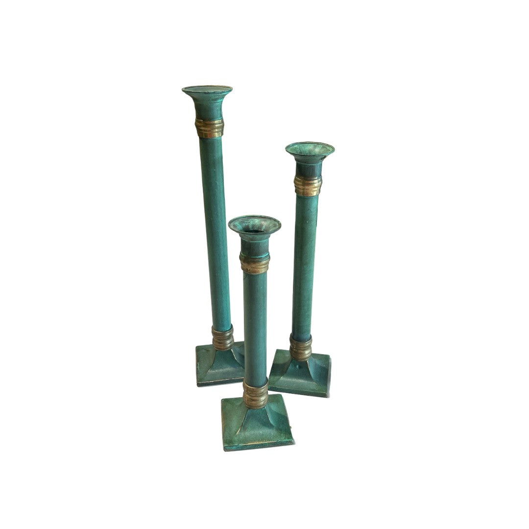 Vintage set of three patina’d brass candle holders
