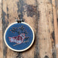 Handmade Embroidered Ornament: Two Birds on tan linen