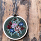 Handmade Embroidered Ornament: Posies on green linen