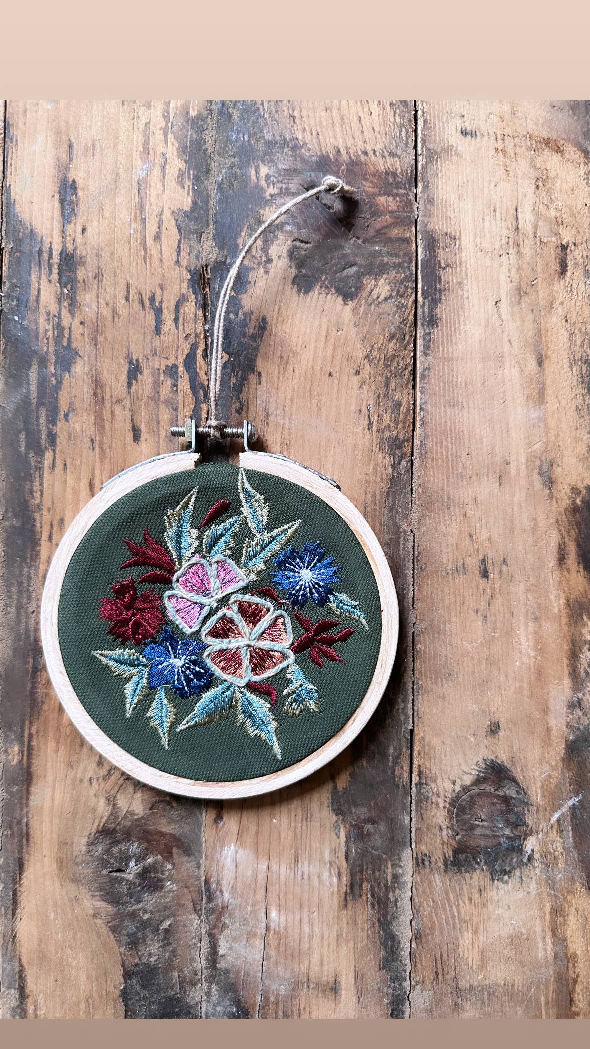 Handmade Embroidered Ornament: Posies on green linen